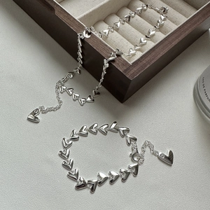 Elegant S925 sterling silver heart-shaped chain jewelry set with necklace and bracelet