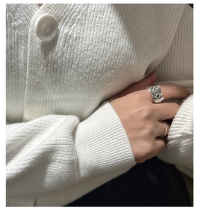 Detailed close-up of S925 silver belt buckle ring with minimalist hollowed design