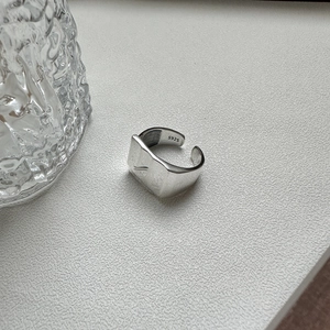 S925 sterling silver ring with irregular hammered texture and minimalist liquid metal finish