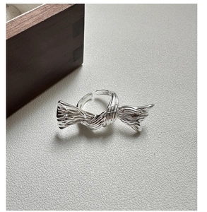 Macro shot showing the S925 sterling silver hallmark inside the textured silver ring
