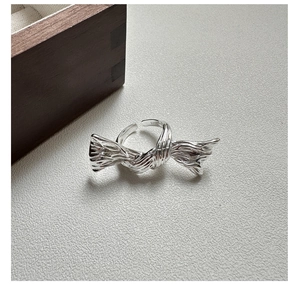 Detail view of the S925 sterling silver butterfly ring with engraved authenticity stamp