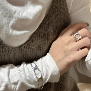Modern S925 sterling silver hollow oval ring and matching bangle set on model