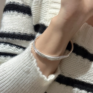 Irregular liquid metal silver open bangle bracelet for women with sleek wave design