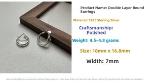 Macro detail of S925 sterling silver double-layered earrings with polished finish