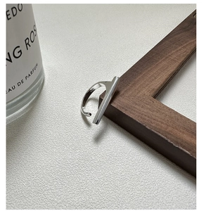Macro detail of S925 sterling silver minimalist bar ring with visible hallmark stamp
