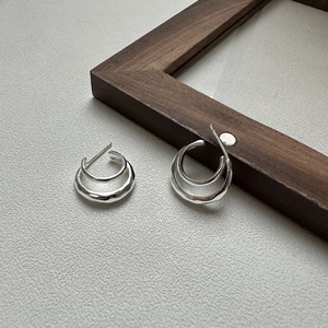 Minimalist S925 sterling silver double-layer hoop earrings with molten lava texture