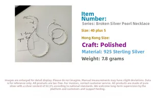 Detailed view of S925 sterling silver crushed silver necklace with baroque pearl accents