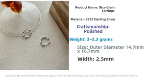 Macro shot of S925 sterling silver rice-shaped earrings with polished finish details