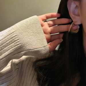 Minimalist S925 sterling silver matte hoop earrings with irregular gold finish on model