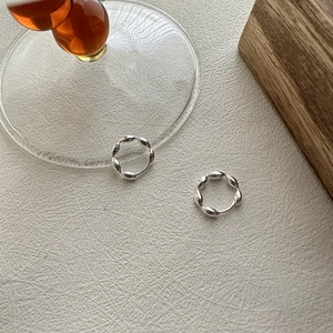 Elegant S925 sterling silver hoop earrings with a textured beaded twist design for women