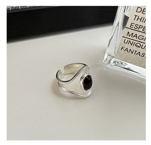 Macro shot of S925 sterling silver hallmark on the adjustable band with black onyx