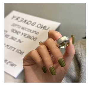 Detailed view of wide S925 sterling silver ring with brushed matte texture finish