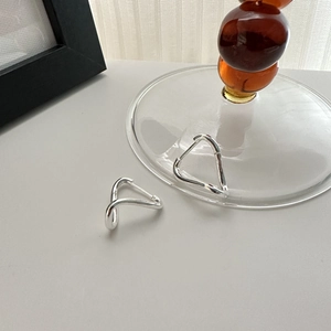 Minimalist 925 sterling silver twisted hoop earrings with a high-polished mirror finish