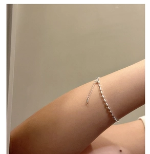 Macro view of S925 sterling silver beaded bracelet showing adjustable lobster clasp