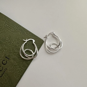 Minimalist S925 sterling silver interlocking hoop earrings with a sleek double-layered design