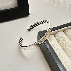 Minimalist S925 sterling silver open bangle with gear texture on black gift box