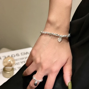 Minimalist S925 sterling silver beaded bracelet with heart charm and pearl accent ring