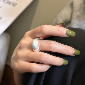 Minimalist S925 sterling silver brushed ring with wide band design worn on the finger