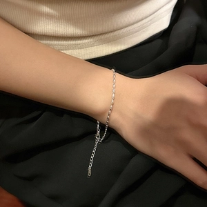S925 sterling silver minimalist bead chain bracelet with lobster clasp on woman's wrist