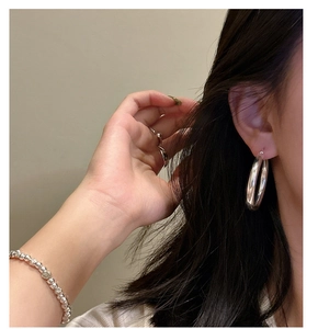 Polished S925 silver set including large hoop earrings, beaded bracelet and minimalist ring