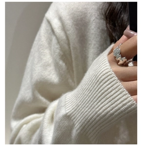 Close-up of S925 sterling silver ring featuring an irregular liquid metal texture design
