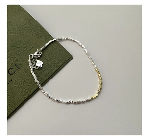 Detail view of S925 sterling silver beaded bracelet with heart charm and lobster clasp