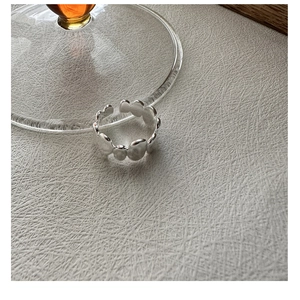 Detailed view of S925 sterling silver open ring with irregular bubble texture finish