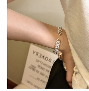 Detailed close-up of S925 sterling silver cuff bracelet with micro-pave cubic zirconia