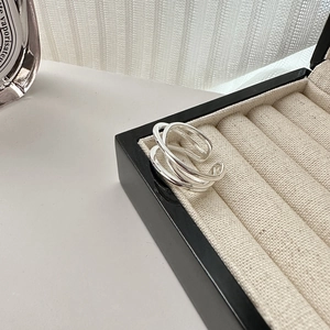 Minimalist S925 sterling silver multilayer intertwined ring in a jewelry box