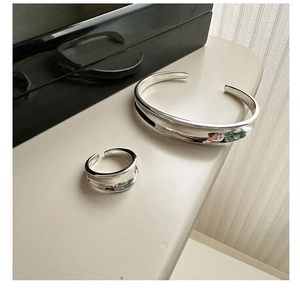 Polished S925 sterling silver set featuring minimalist wide concave ring and open cuff bracelet
