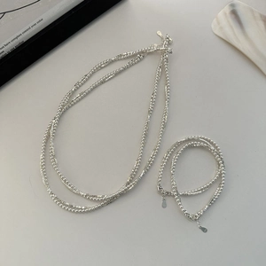 S925 sterling silver jewelry set featuring beaded necklace and multi-layer bracelet
