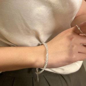 S925 sterling silver layered bracelet with pearls and sparkling faceted beads on wrist