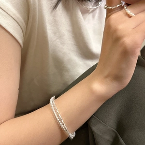S925 sterling silver layered bracelet featuring white pearls and faceted silver beads