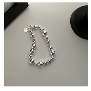 Macro shot of S925 sterling silver beads with lobster clasp and adjustable extension chain