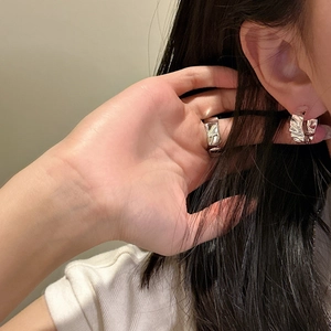 Minimalist S925 sterling silver liquid metal earrings and ring set on female model