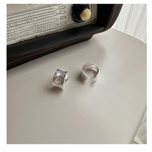 Detail of S925 sterling silver rings featuring unique hammered texture and vintage finish