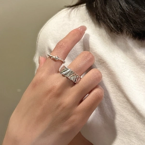 S925 sterling silver ring set with minimalist irregular fold texture and open band design