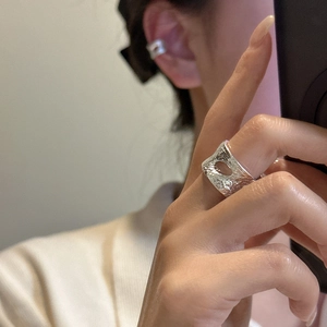 S925 sterling silver ring and ear cuff set featuring irregular crushed lava texture