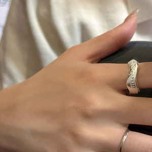 Modern 925 sterling silver wavy ring featuring artistic letter engravings for women