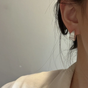 Minimalist S925 sterling silver multi-layer ear cuff featuring vertical wave texture