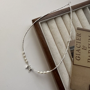 S925 silver bow necklace with elegant pearls and crushed silver texture chain for women