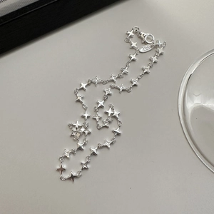 Minimalist S925 sterling silver necklace featuring 3D four-pointed star link chain
