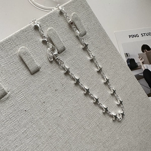 Minimalist S925 sterling silver necklace with four-pointed star pendants for women