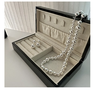 Polished S925 sterling silver bead necklace and stud earrings set in a premium jewelry box
