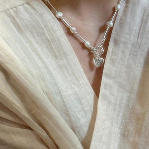 Elegant S925 sterling silver pearl necklace with a vintage heart pendant and T-bar toggle clasp