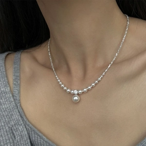 S925 silver pearl necklace with gradient sizes and sparkling zircon pendant on model