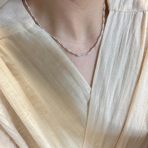 Minimalist double-layered S925 sterling silver snake chain necklace on model neck