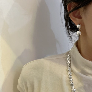 Minimalist S925 sterling silver ball drop earrings and beaded necklace on model