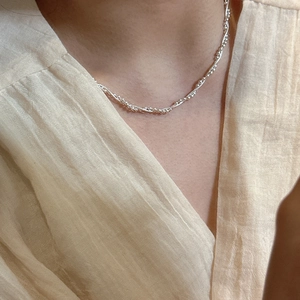 Minimalist S925 sterling silver double-layered snake chain with beads shown on neck