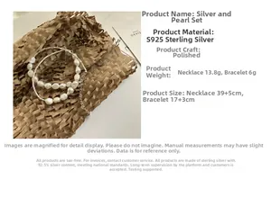 Detailed set of S925 silver beaded necklace and baroque pearl bracelet on rustic paper
